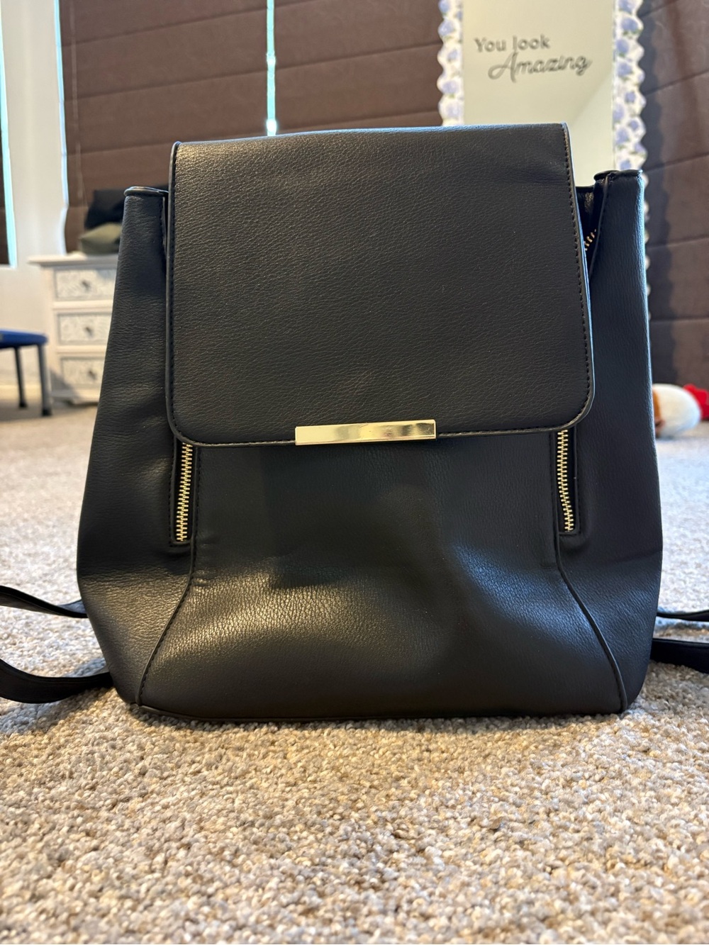 Black Women's Leather Backpack with Gold Accents